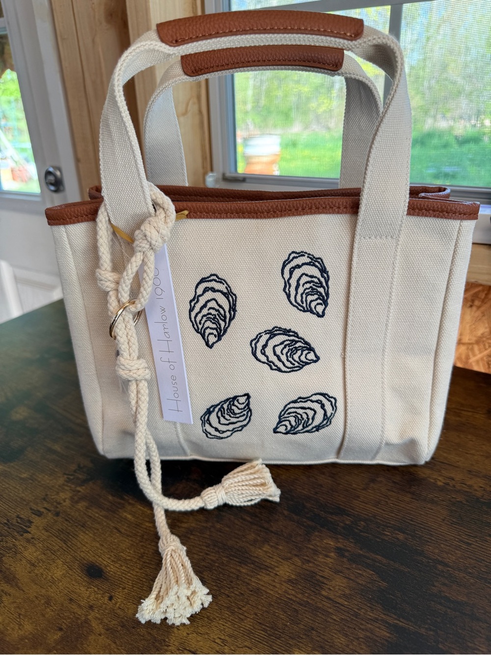 House of Harlow 1960 Cream Canvas Tote with Brown Trim and Navy Oyster Design